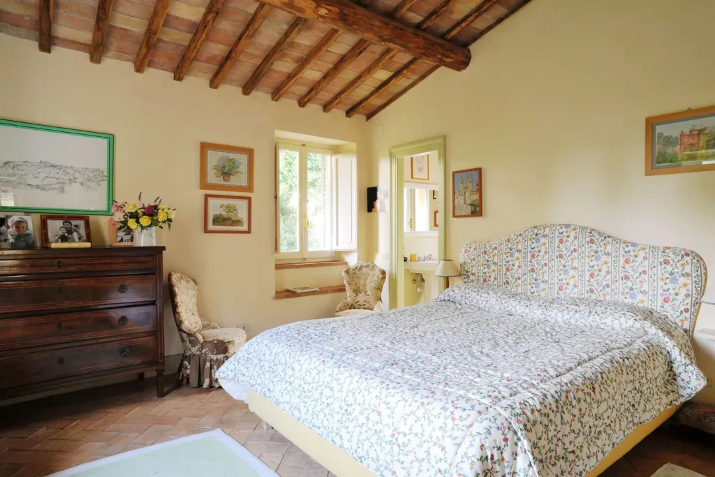 A bedroom under the eaves on the upper level