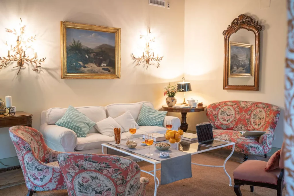 A second sitting room on the upper level, under the roof beams
