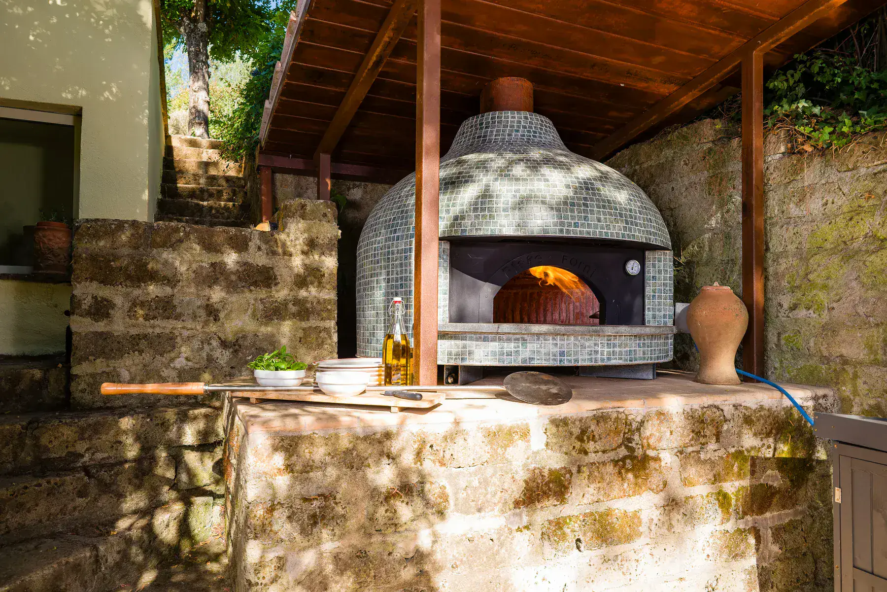 The Pool at Sunset Handmade Neapolitan pizza oven